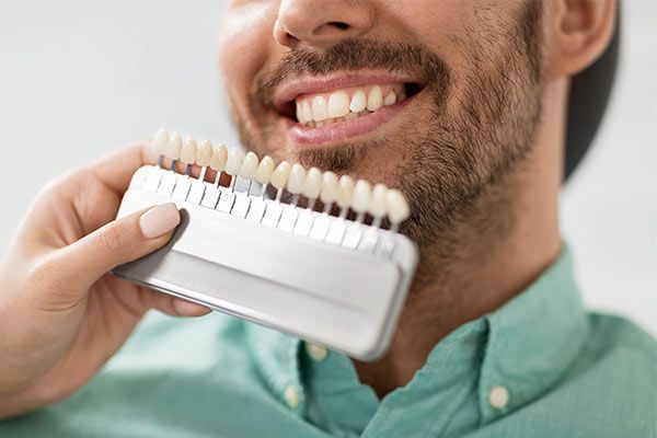 man receiving veneers